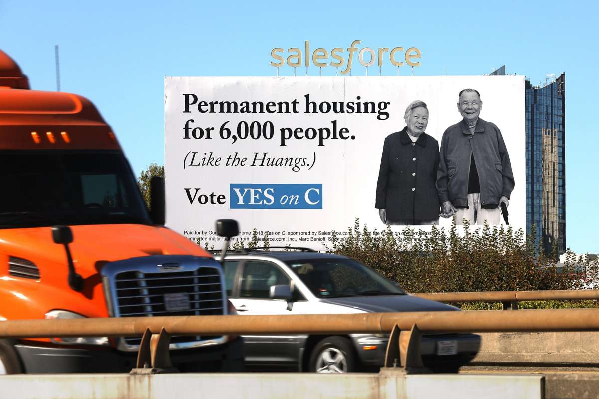 Billboard In San Francisco With Salesforce Logo On Top Of Couple Promoting Permanent Housing Vote Yes On C