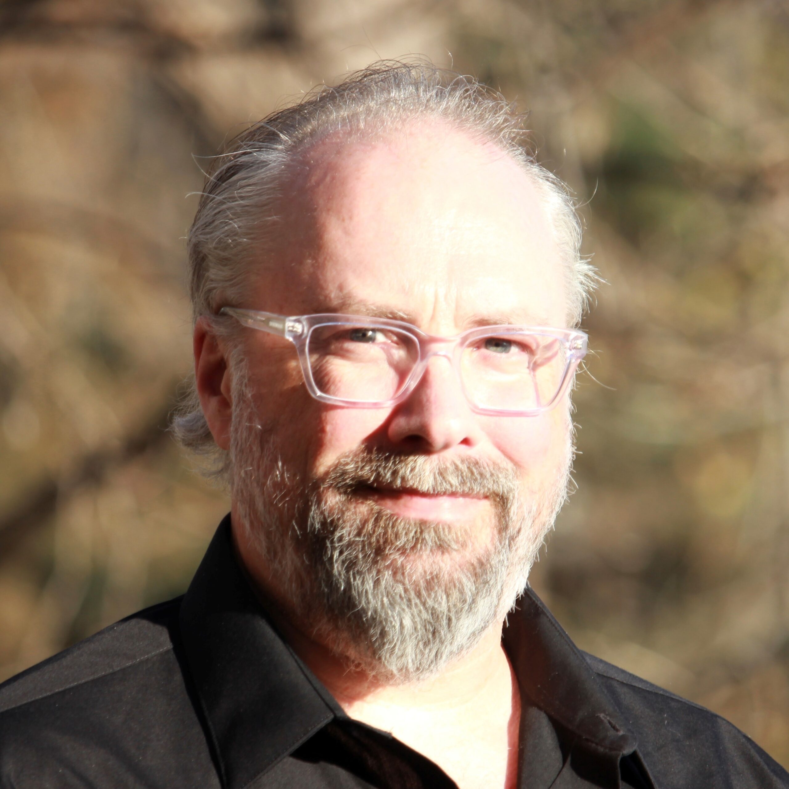 A headshot of Eric Grumdahl